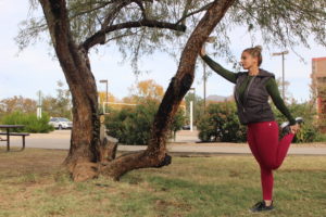 woman stretching outdoors