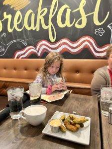 Girl at breakfast place