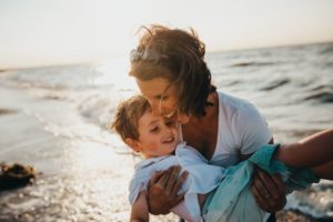 mom and son at the beach