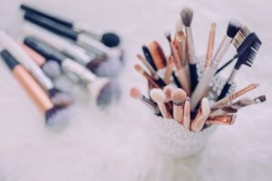 stash of makeup brushes